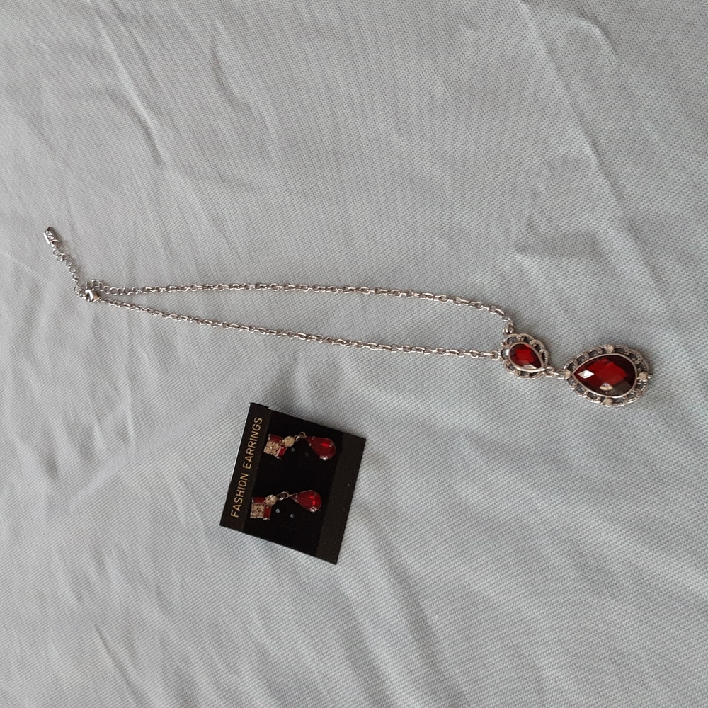 Necklace and ear rings.